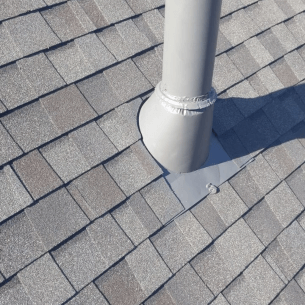 shingle roof replacement around chimney stack